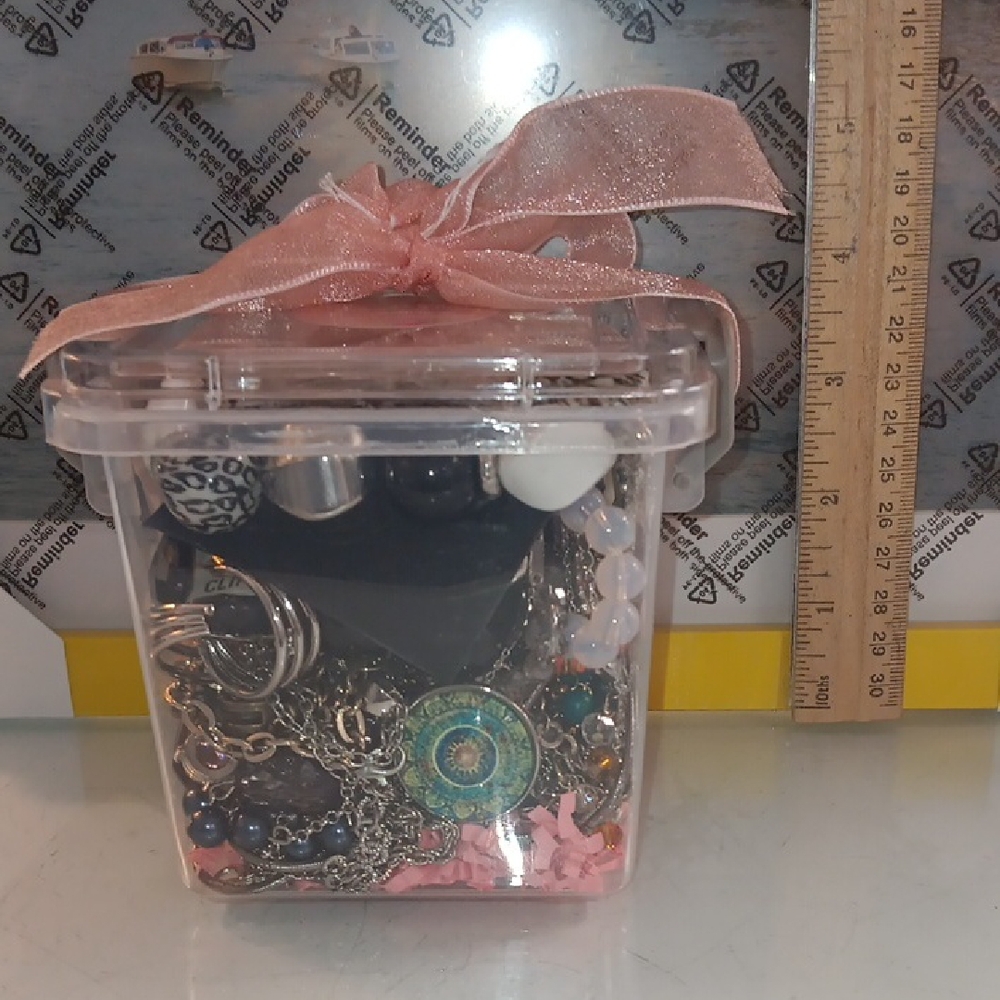Clear Jewelry Storage Box with Pink Ribbon